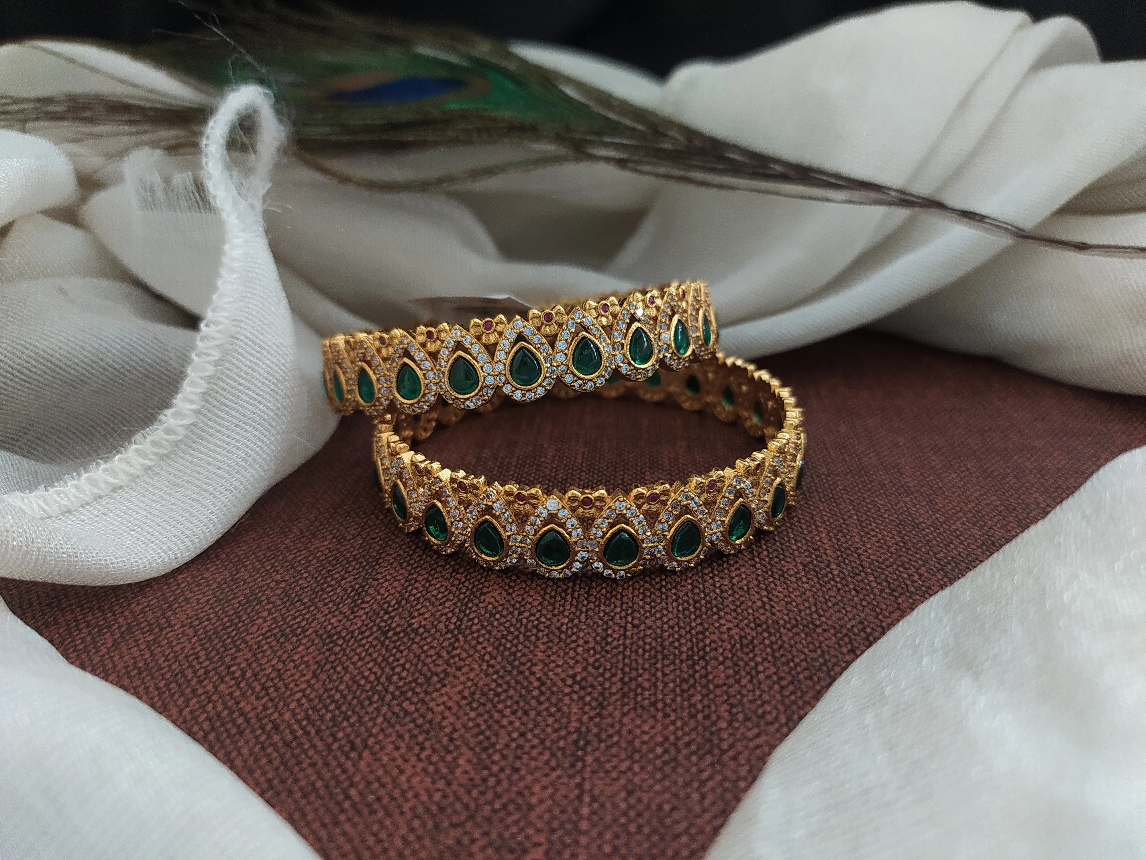 Antique Tilak Shape Bangles with Emerald and Zircon Stones